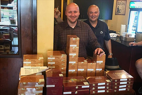 Friends gathered in the main room at Cordova Cigars